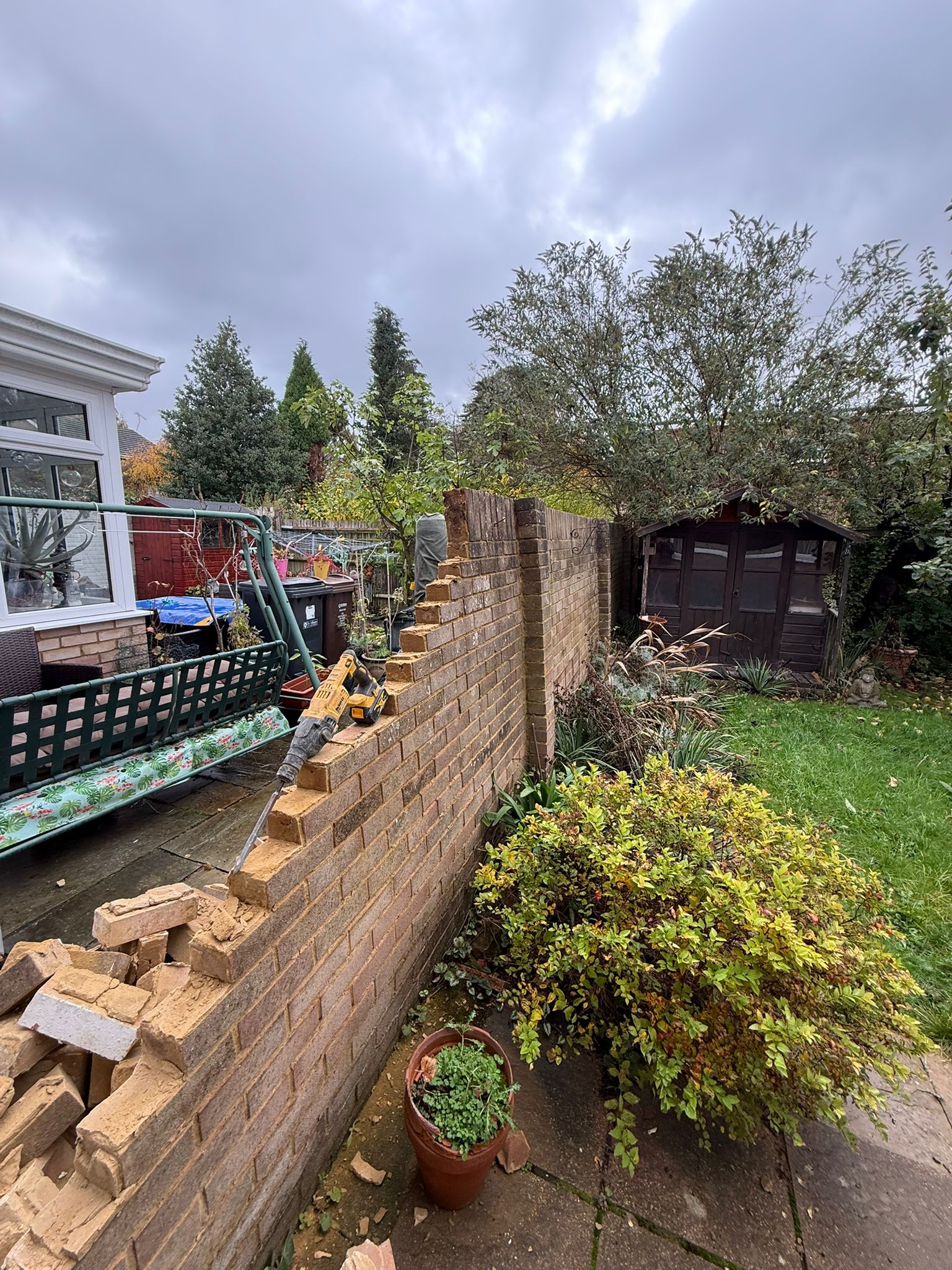 OLD WALL REPLACED WITH NEW FENCE